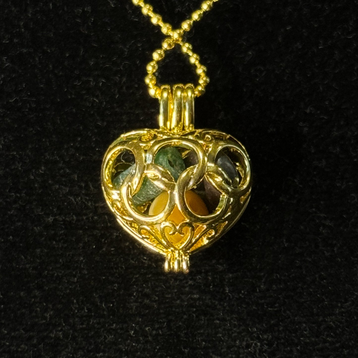 Ancient Roman Glass & Tiger Eye Stone Ancient Roman Bead Necklace in gold-plated Heart casing ,(100 B.C. - 100 A.D.)