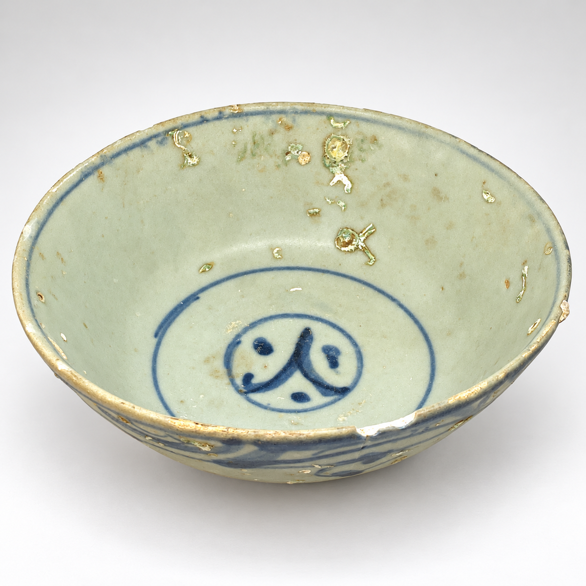 Shipwreck Nguyễn Dynasty Blue-and-White Porcelain Bowl with Floral Motif — ca. Early 19th Century